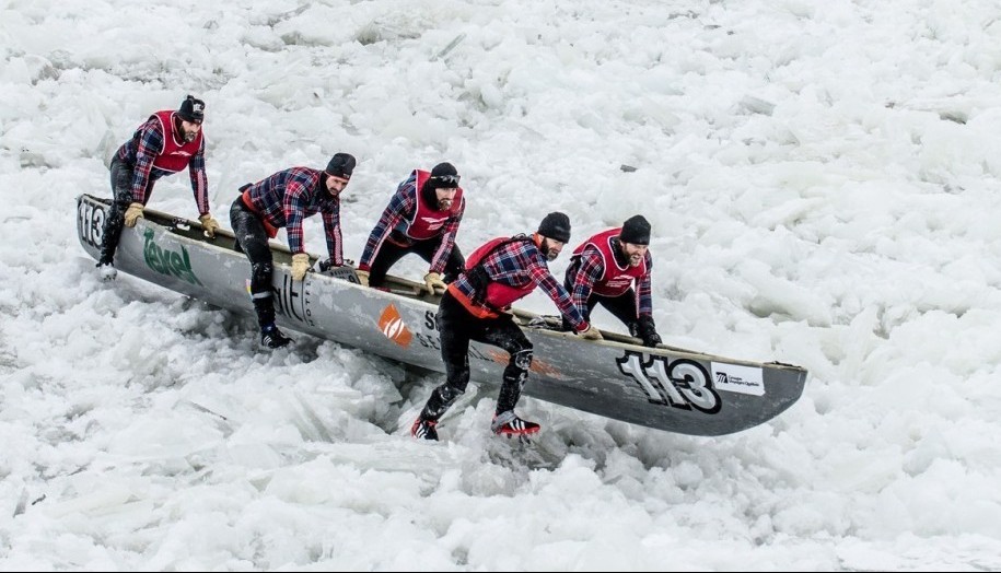 Quebec, Canada - February 8, 2015: This is the Quebec Ice Canoe Race Competition that happens on the St.Lawrence River every winter.
